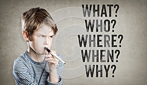 5W questions, what, who, where, when, why, Boy on grunge background photo