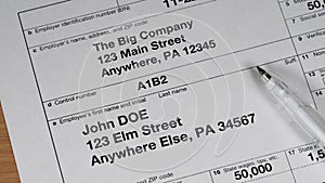 W2 tax form for man person John Doe