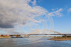 Waal bridge with blue sky and cloud