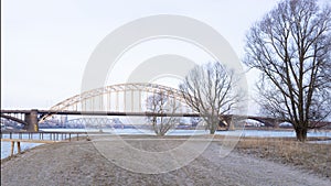 Waalbridge over the flooded river Waal at Nijmegen in wintertime