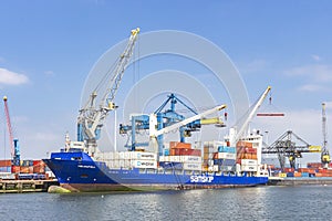 In the waalhaven of Rotterdam are huge cranes used for loading and unloading of container ships 3