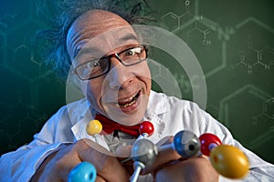 Wacky scientist with molecular structure model