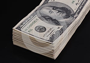 Wad of 100 dollar bills