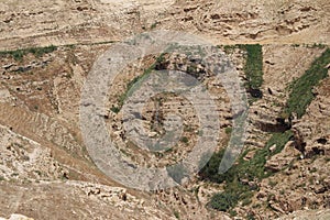 Wadi Qelt in Judean desert near Jericho, nature, stone, rock and oasis. Unseen, unknown, unexplored places, hidden travel