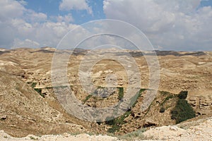 Wadi Qelt in Judean desert near Jericho, nature, stone, rock and oasis. Unseen, unknown, unexplored places, hidden travel