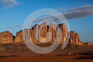 Wadi Rum Desert in Jordan. On the Sunset. Panorama of beautiful sand pattern on the dune. Desert landscape in Jordan.