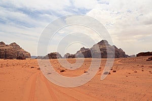 Wadi Rum desert panorama with dunes, mountains and sand that looks like planet Mars surface, Jordan