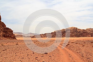 Wadi Rum desert panorama with dunes, mountains and sand that looks like planet Mars surface, Jordan