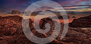 Wadi Rum desert panorama, red sand with stone and rock. Evening orange sunset in nature. Travel Jordan, Arabia nature. Wadi Rum