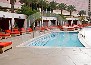 Wading Pool at Resort with Orange Chaise Lounges