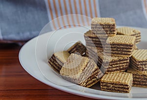 Wafer biscuits on saucer