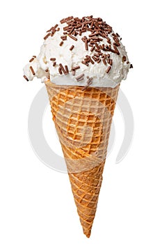 Wafer cone with white scoop of ice cream and chocolate sprinkles