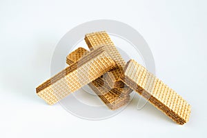 Wafers with chocolate on white background.