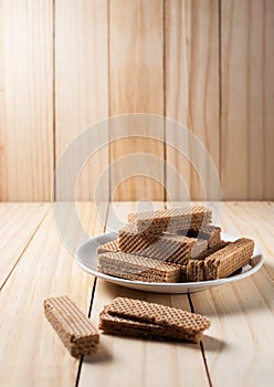 Wafers with chocolate in white plate