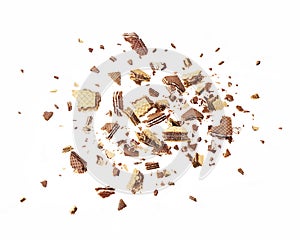 Wafers are explosive into pieces, with a chocolate splash isolated on a white