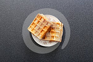 Wafers in a saucer. Top view.