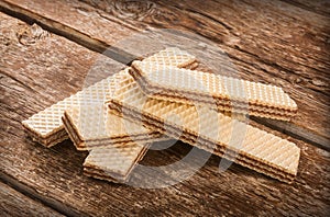 Wafers on wooden table. photo