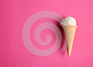 Waffle cone with tasty vanilla ice cream