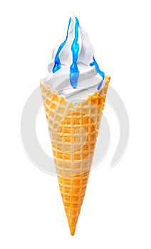 Waffle cone with white ice cream and blue topping isolated on white background Clipping path