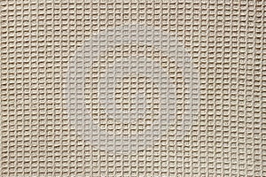 Waffle fabric with visible texture copy space for text, web print design elements. Closeup of light natural cotton