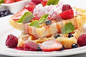 Waffle with fruit and whipped cream