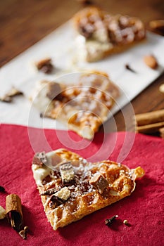 Waffle with white chocolate and powdered sugar