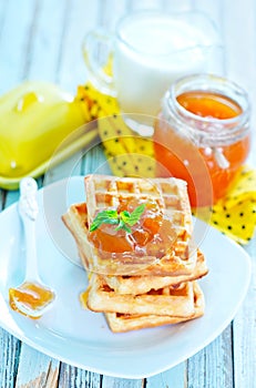 Waffles with apricot jam