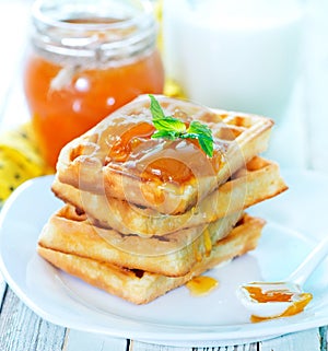 Waffles with apricot jam