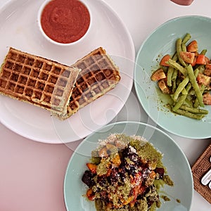 Waffles, beans, salad. Healthy vegan food. Cooking background. Healthy eating. Vegetarian food.