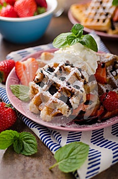 Waffles with berries, strawberries