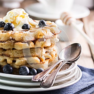 Waffles with blueberries and ice cream