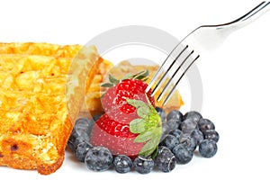 Waffles, blueberries and strawberries