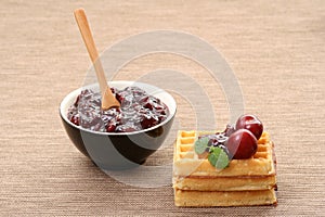 Waffles and fresh cherry jam