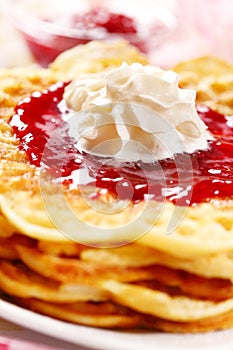 Waffles with fresh strawberry jam