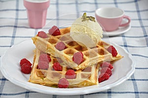 Waffles with ice cream and berries