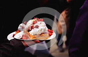 Waffles with strawberries and cream