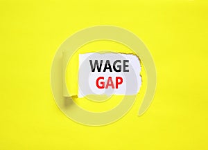 Wage gap symbol. Concept words Wage gap on beautiful white paper on a beautiful yellow background. Business, support and wage gap