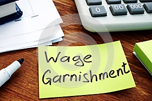 Wage Garnishment written on the sheet photo