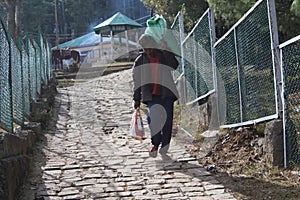 a daily wager man returning back home after his work