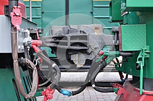 Wagon coupling. The coupler of two railway trains or freight wagons with railway sleeve