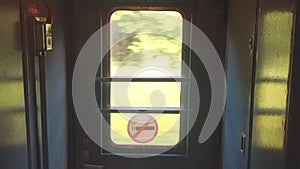 Wagon vestibule railway view from the window movement forest indoors window. forest road traffic motion train travel