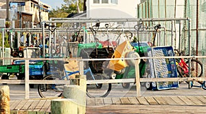 Wagons and bikes wait at the Ferry in Fire Island, NY