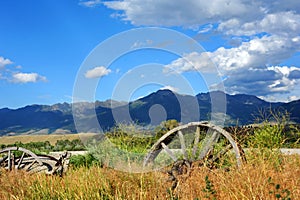 Wagons face Absaroka Mountain Range photo