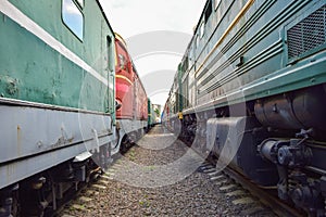 Between the wagons of vintage trains photo