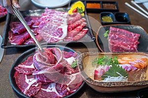 wagyu beef in plate on korean barbeque table in Japanese restaurant