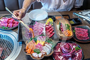 wagyu beef in plate on korean barbeque table in Japanese restaurant