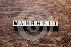 Wahrheit - truth, word concept on building blocks, text