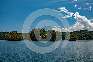 Waigeo, Kri, Mushroom Island, group of small islands in shallow blue lagoon water