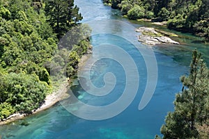 Waikato River below in natural landscape at Taupo