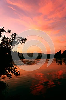 Waikato river with stunning sunset reflections